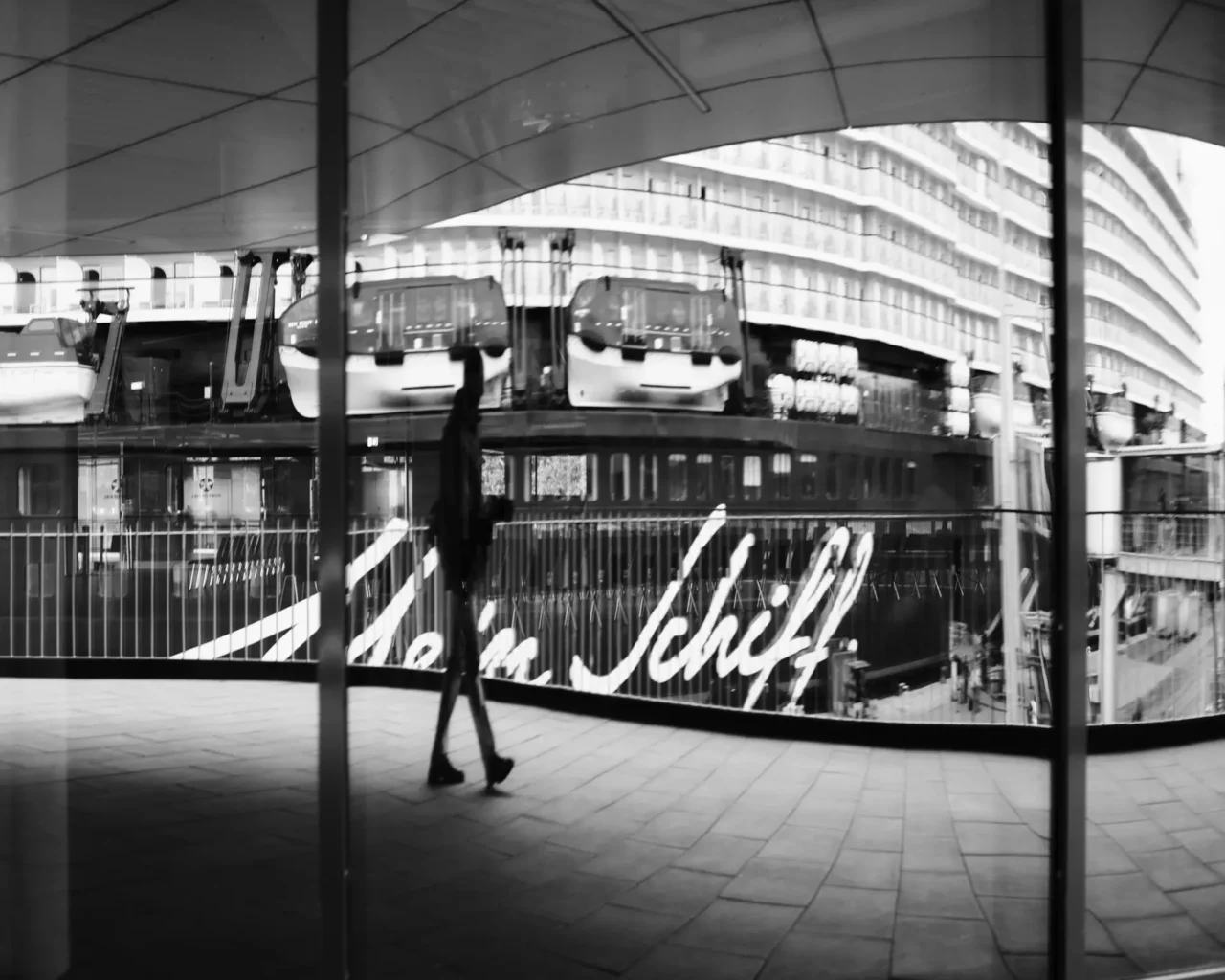 reflective distortions in a window. Like a world unhinged.
